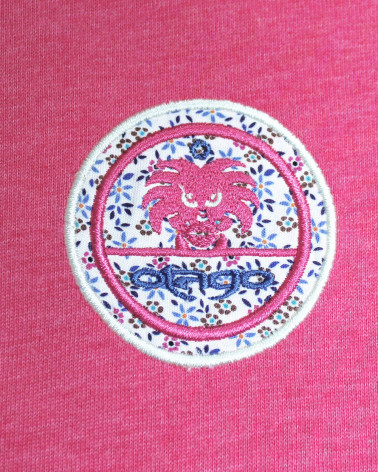 Broderie côté coeur du polo Cross rose pour homme